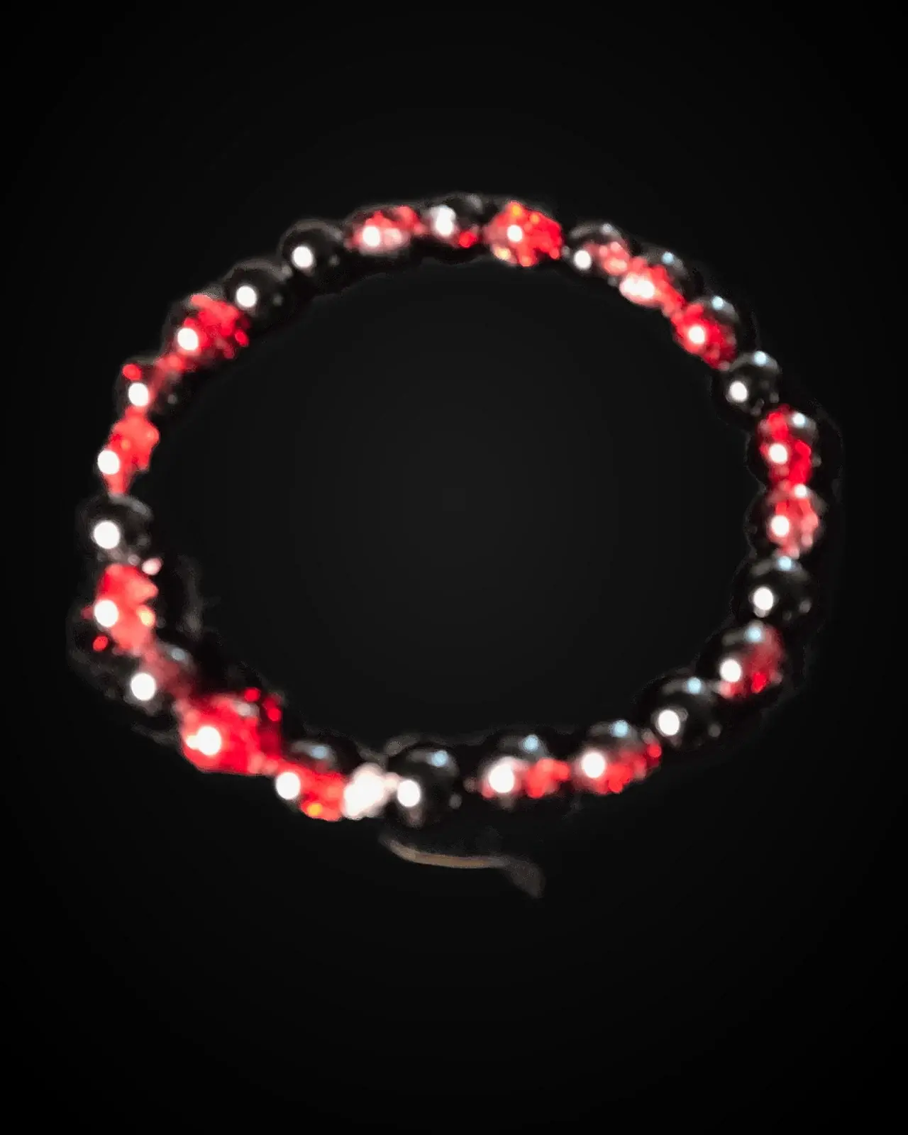 Garnet Night — Black rounds & faceted red