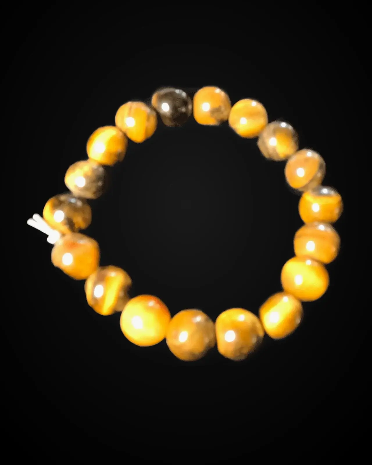 Tiger’s Eye — Chatoyant honey-brown rounds
